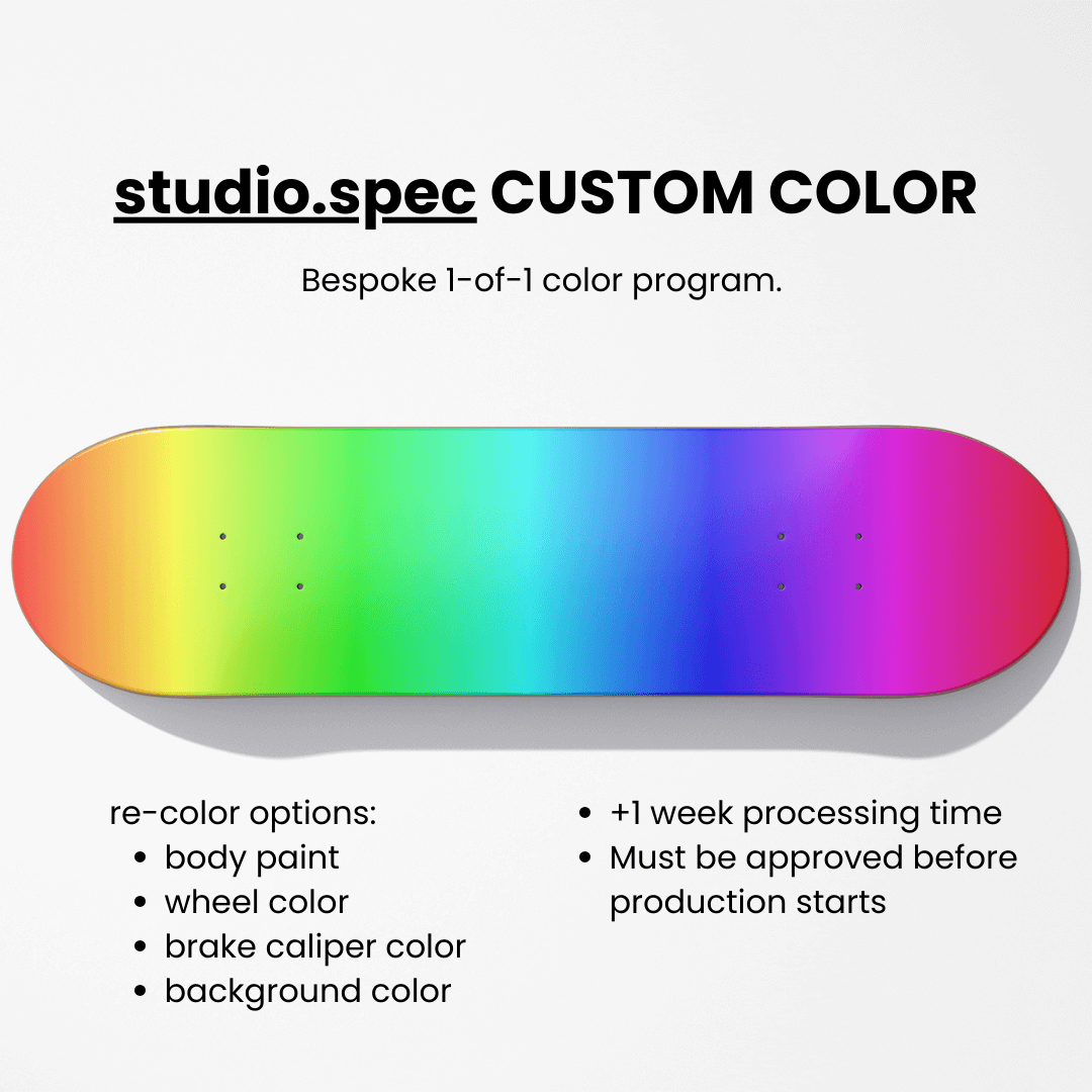 Colorful skateboard deck with text about studio.spec custom color program on a white background