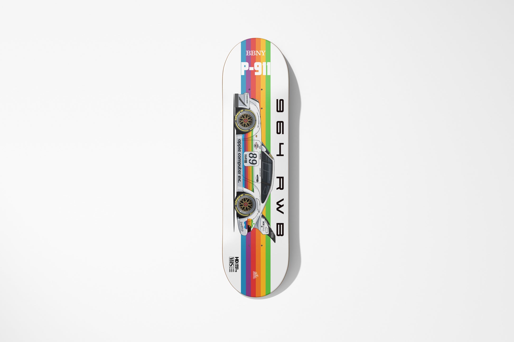 Skateboard deck with car design on a white background