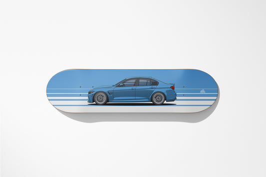 Skateboard deck with a blue car design on a white background