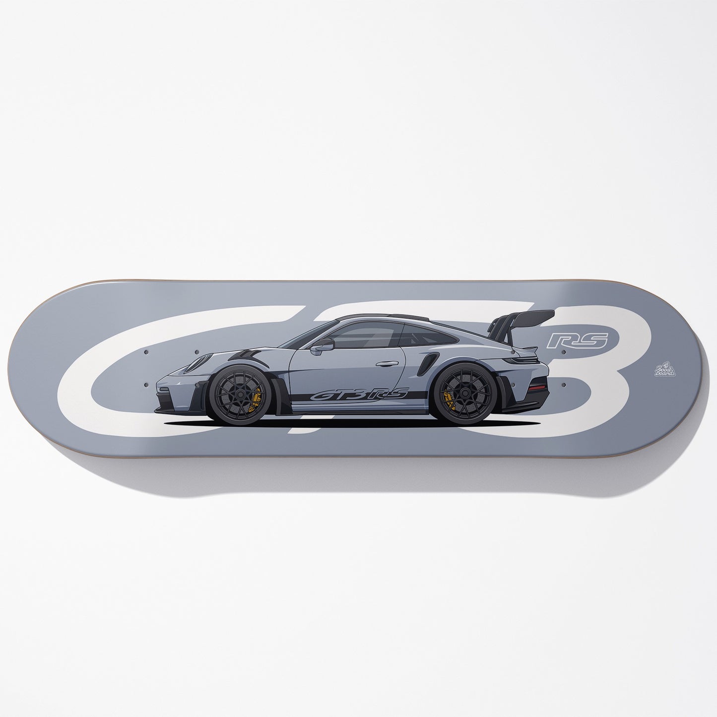 Skateboard deck with a car design and 'RS' branding on a yellow background