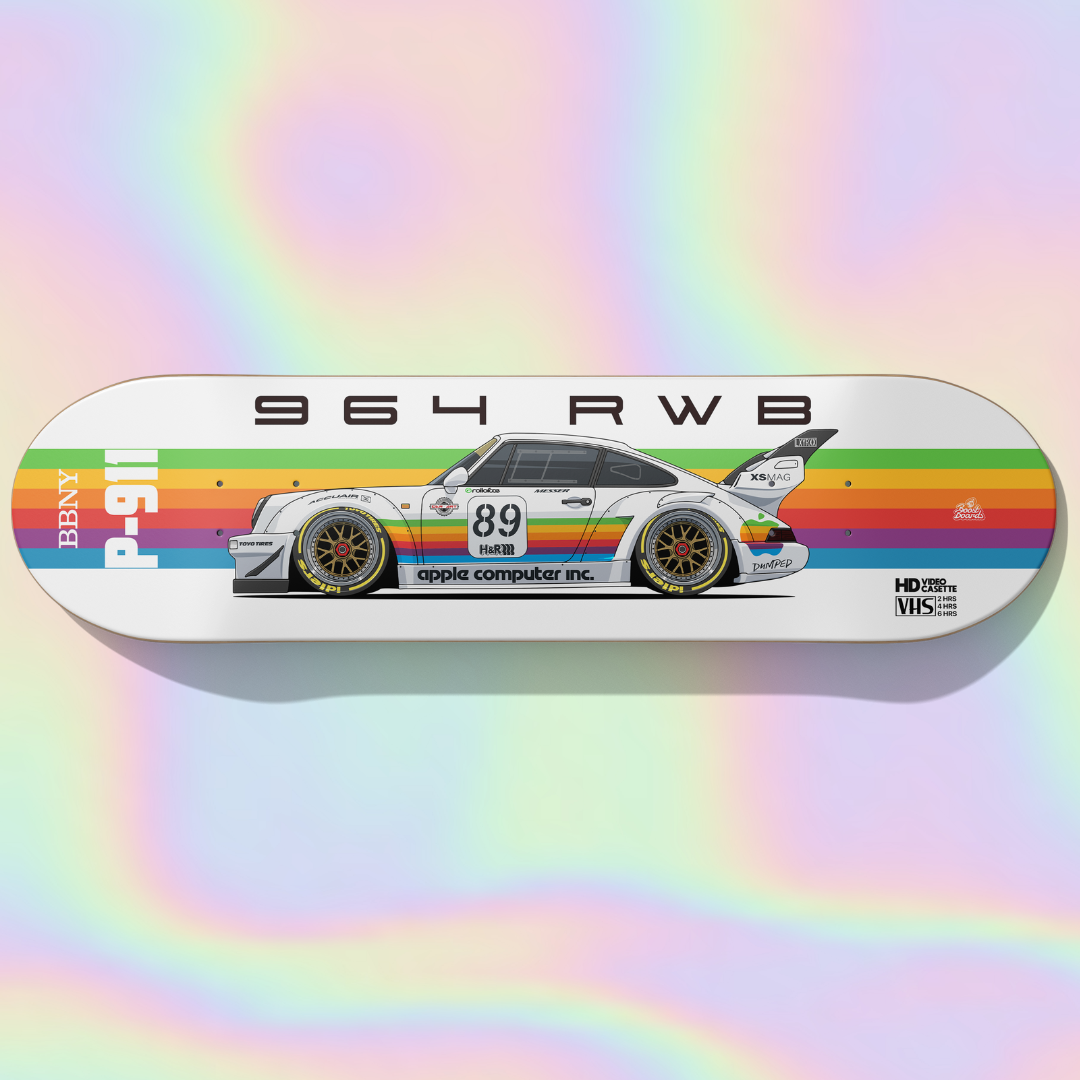 Skateboard deck with a car design on a colorful, gradient background