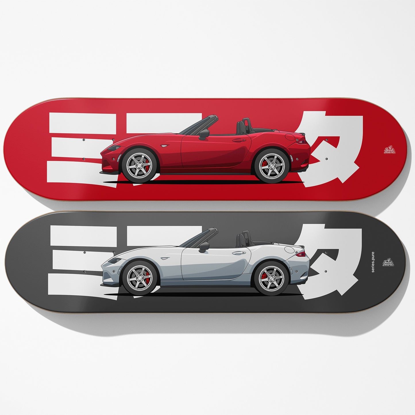 Two skateboard decks with red and white car design on a red deck and gray and white car design on a gray deck.