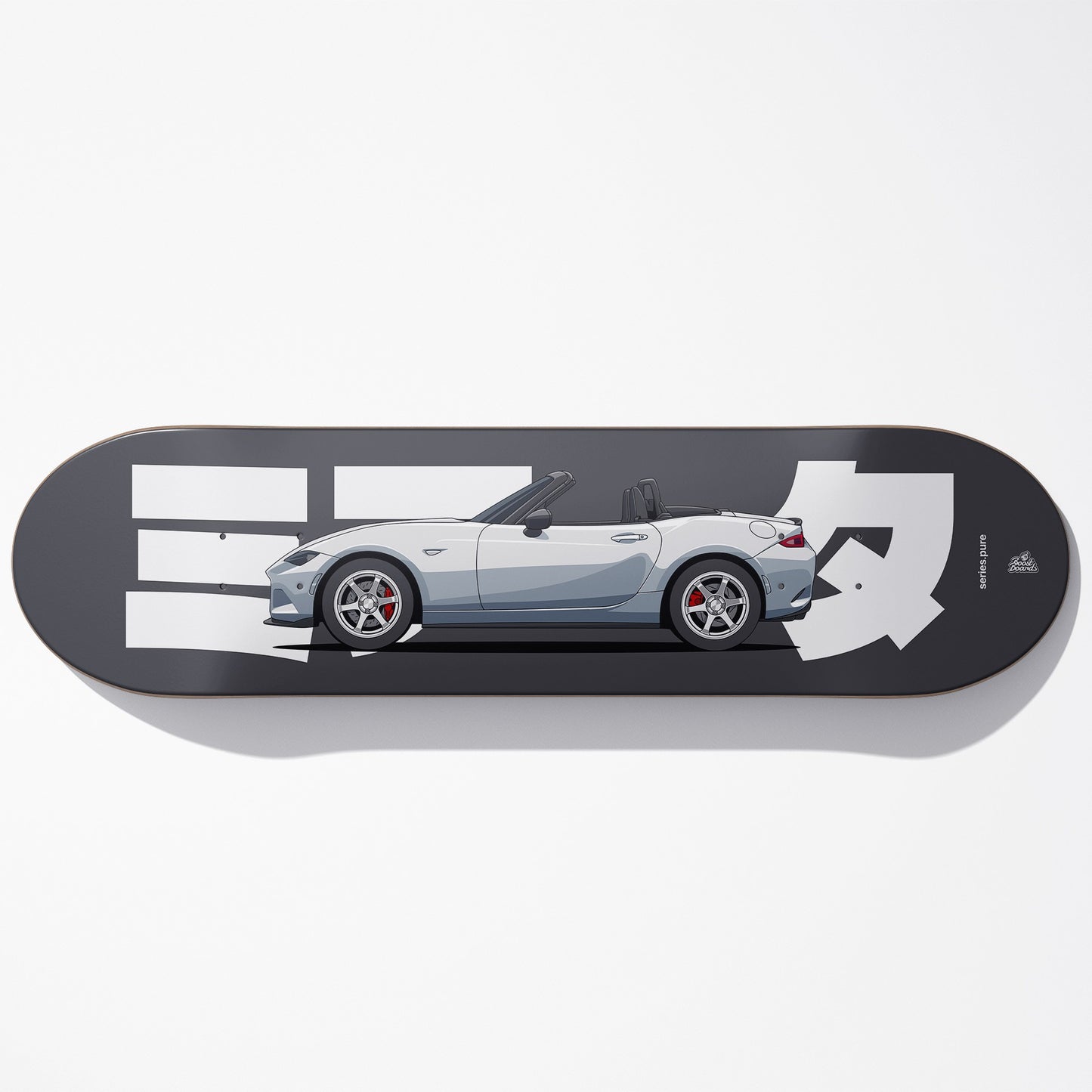 Skateboard deck with a car design and branding on a white background