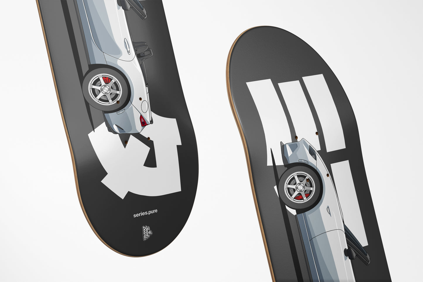 Two skateboard decks with car designs on a white background