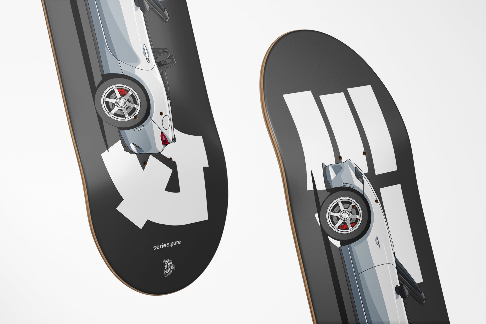 Two skateboard decks with car designs on a white background