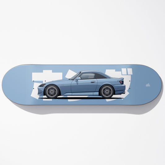 Skateboard deck with a blue car design on a white background