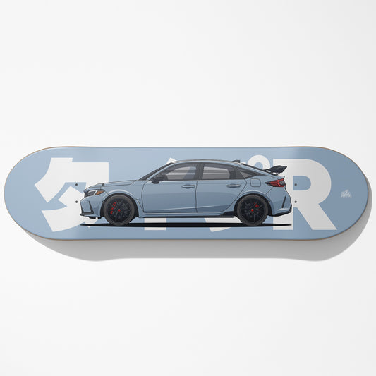 Skateboard deck with a car design on a light blue background